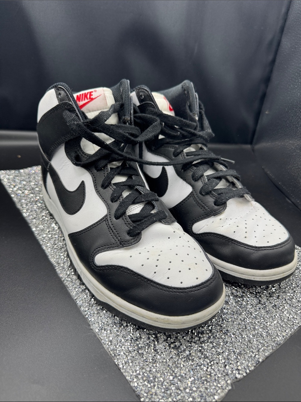 Nike women’s Black and White High-Top Sneakers with Red Logo
